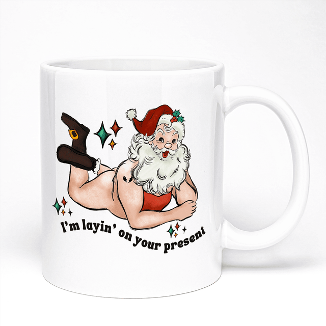 Hilarious Christmas Mug For Grownups Featuring Laying On Your Present Santa Design | 11oz Ceramic Mug, White Handle And White Inner | 10 Colour Options Available